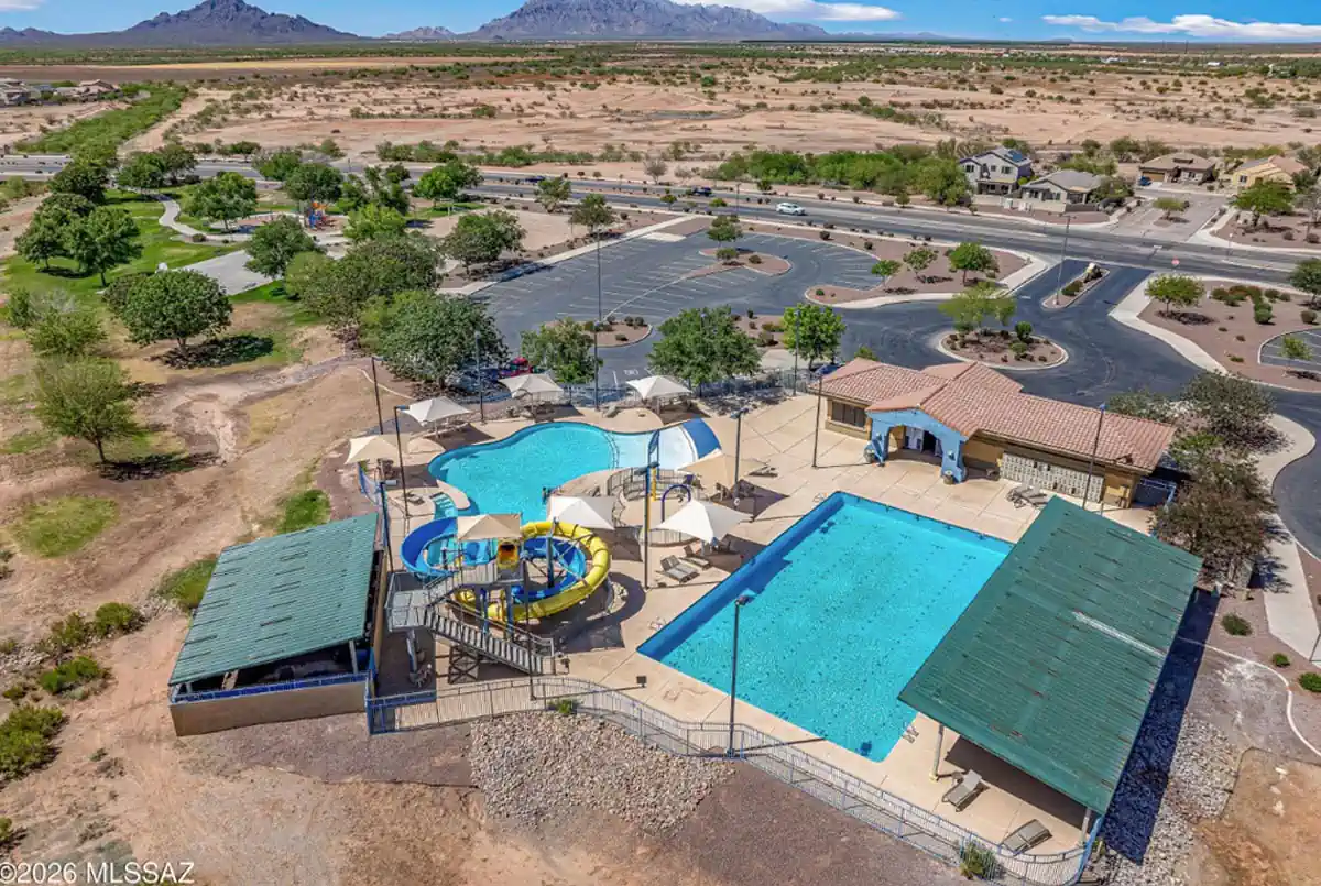 Community Swimming Pool and slide view of 21163 E Treasure Road property, by Edgar Huerta Real Estate Agent in Tucson