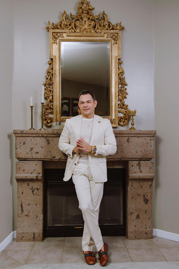 Edgar Huerta portrait in front of a chimney